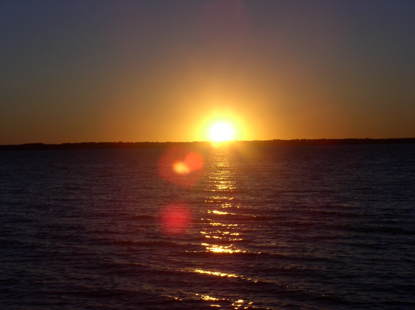 Golden-hour water / horizon