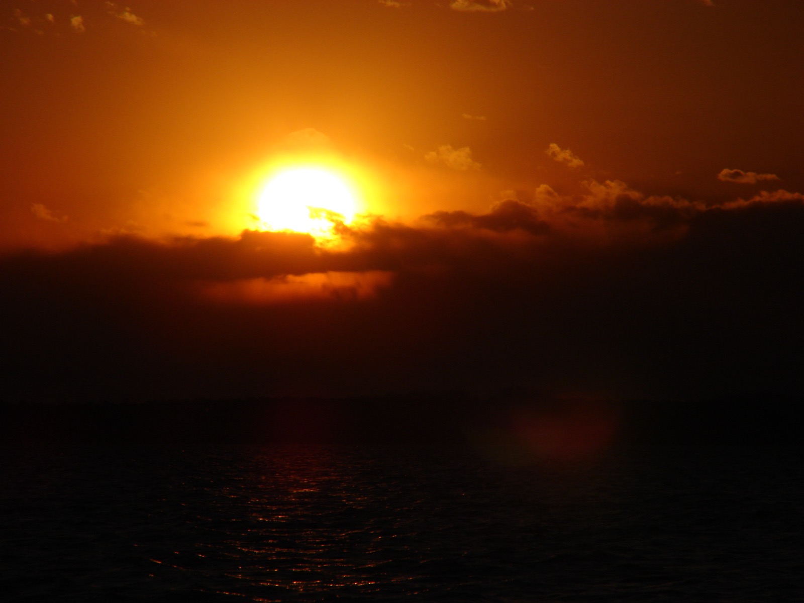 Dramatic dawn / dusk over water