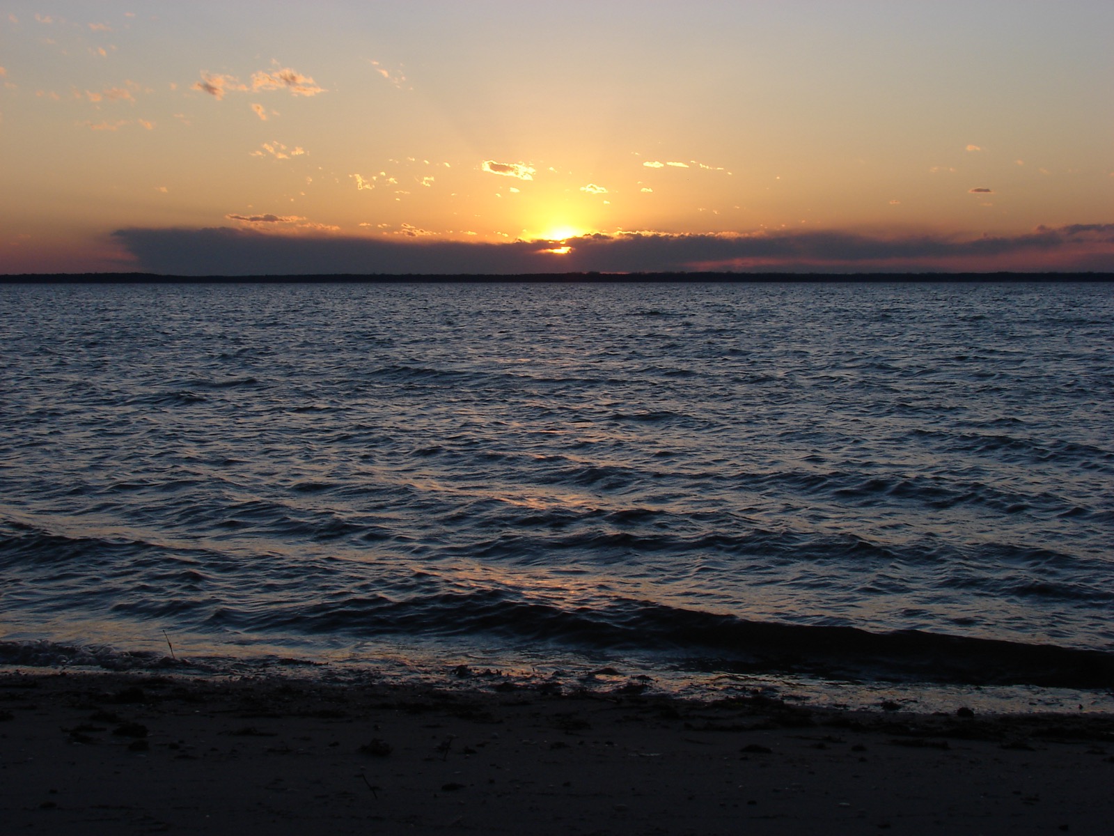 Dramatic dawn / dusk over water
